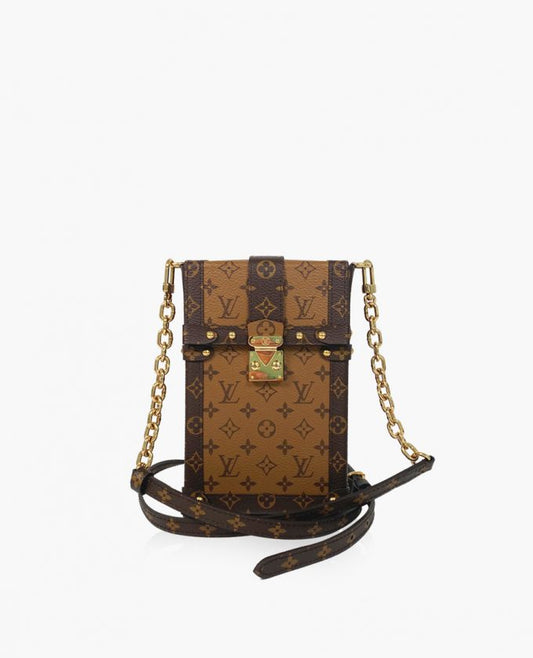 Cuero | Monogram Vertical Trunk Pochette Camel