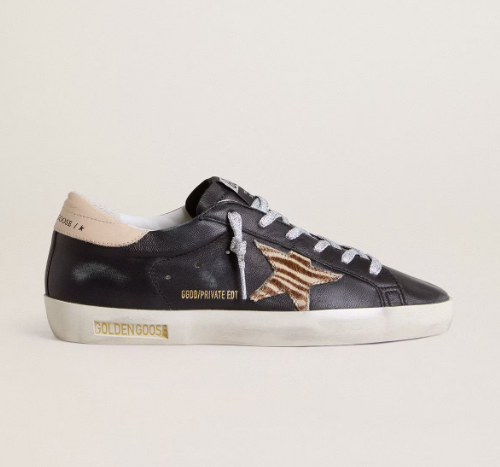 Cuero | Women’s Super-Star in black leather with zebra-print