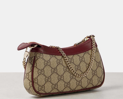 Cuero | Ophidia mini panda-appliqué shoulder bag