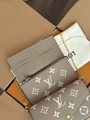 Louis Vuitton crossbody clutch