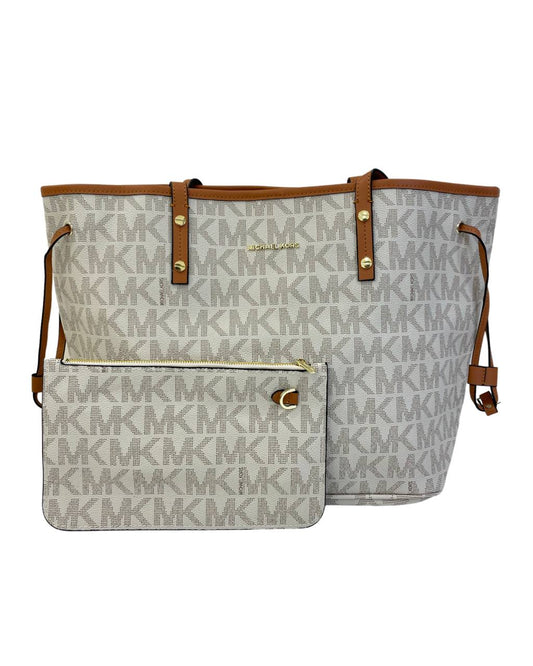 Cuero | Jet Set Travel in Signature Coated Monogram Large Logo