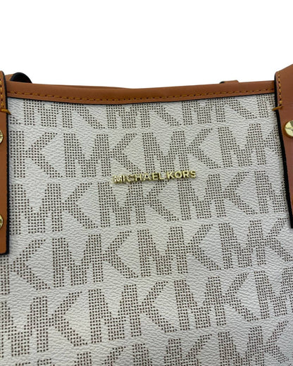 Cuero | Jet Set Travel in Signature Coated Monogram Large Logo