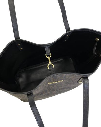 Cuero | Jet Set Travel in Signature Coated Monogram Large Logo