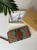 Dempsey Large Phone Wallet In Signature Jacquard With Stripe And Coach Patch