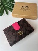 Coach Medium Corner Zip Wallet In Signature Canvas