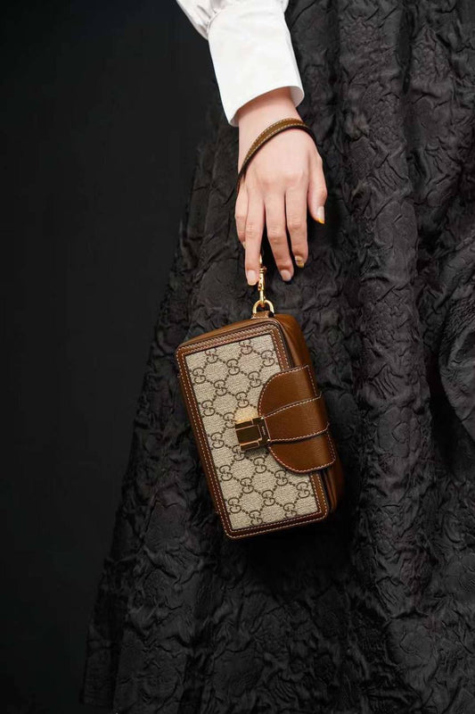 Cuero | GG-Supreme mini canvas and leather cross-body bag