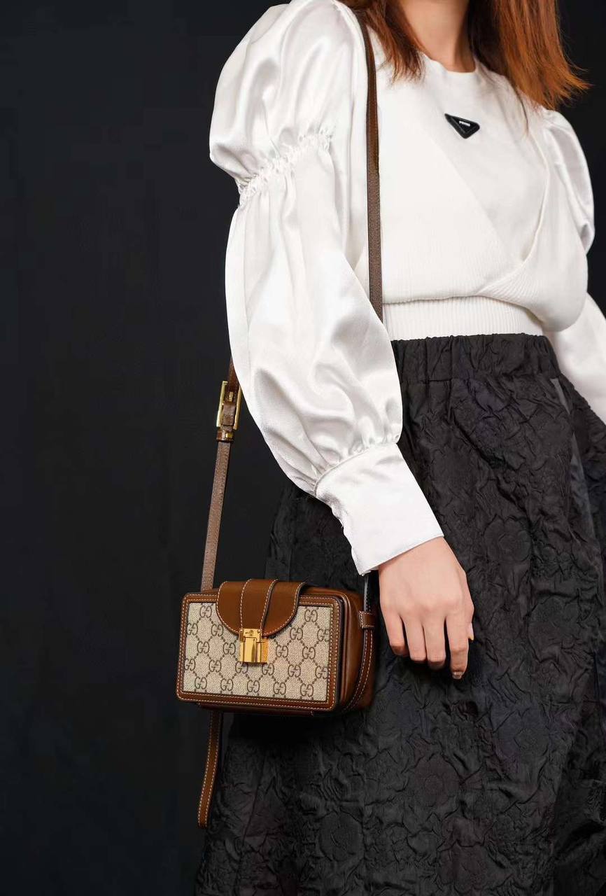 Cuero | GG-Supreme mini canvas and leather cross-body bag