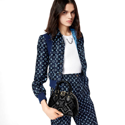 Cuero | VUITTON Banane' bubblegram Alma BB bag with detachable strap & gold metallic hardware