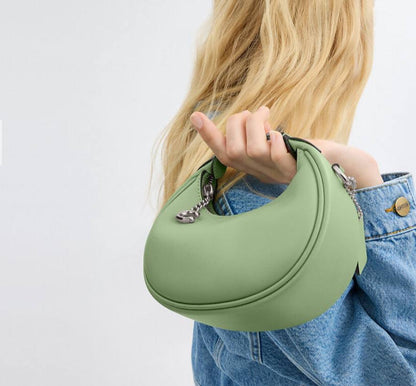 Cuero | Jonie Bag In Signature Canvas - Pale Pistachio