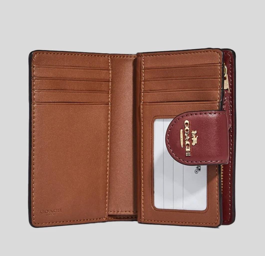 Cuero | Medium Corner Zip Wallet In Signature Canvas With Wildflower