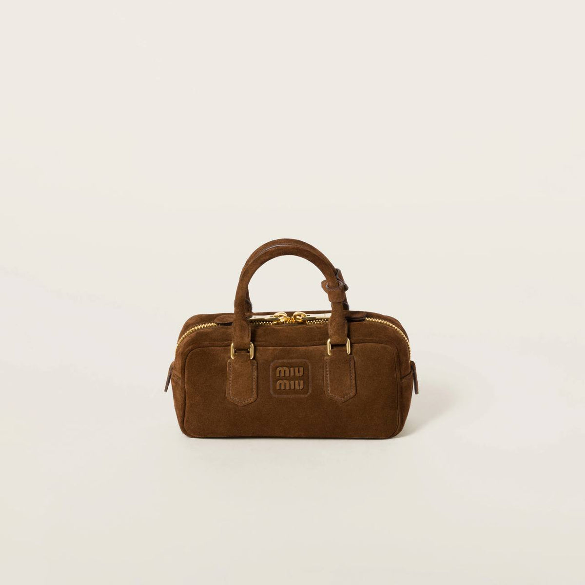 Cuero | Arcadie padded suede top-handle bag in Cocoa Brown