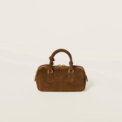 Cuero | Arcadie padded suede top-handle bag in Cocoa Brown