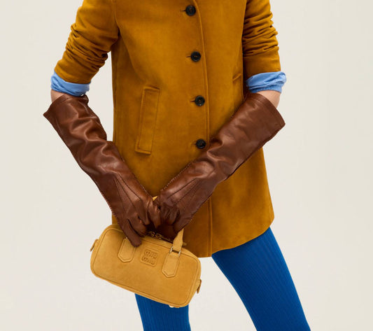 Cuero | Arcadie padded suede top-handle bag in Whiskey