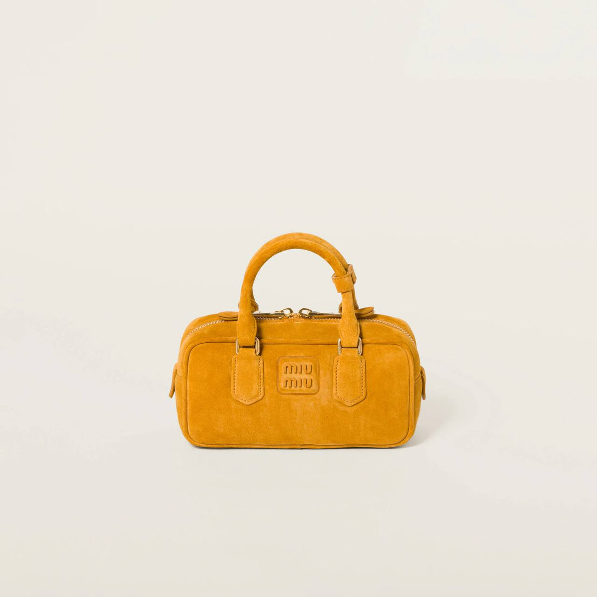 Cuero | Arcadie padded suede top-handle bag in Whiskey