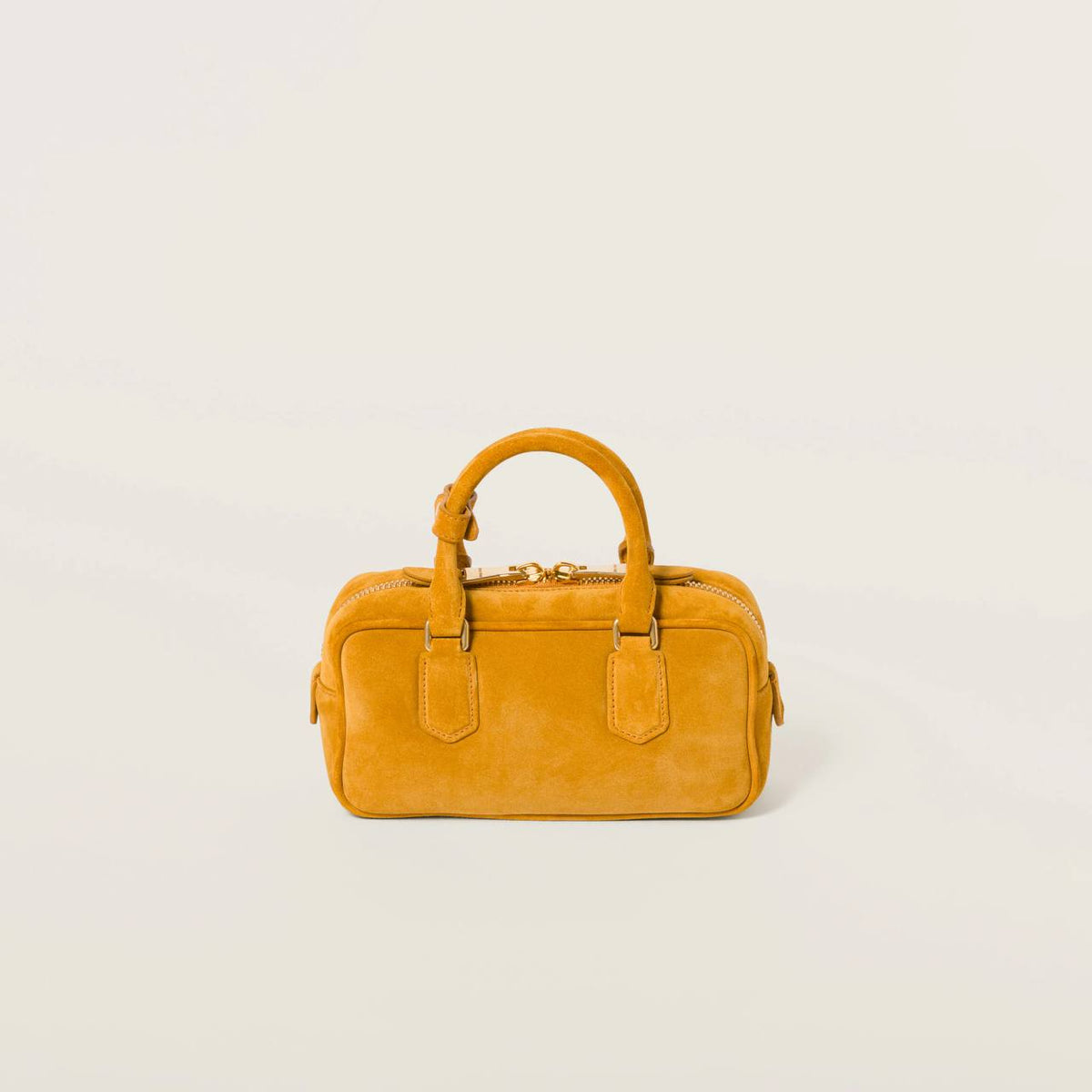 Cuero | Arcadie padded suede top-handle bag in Whiskey