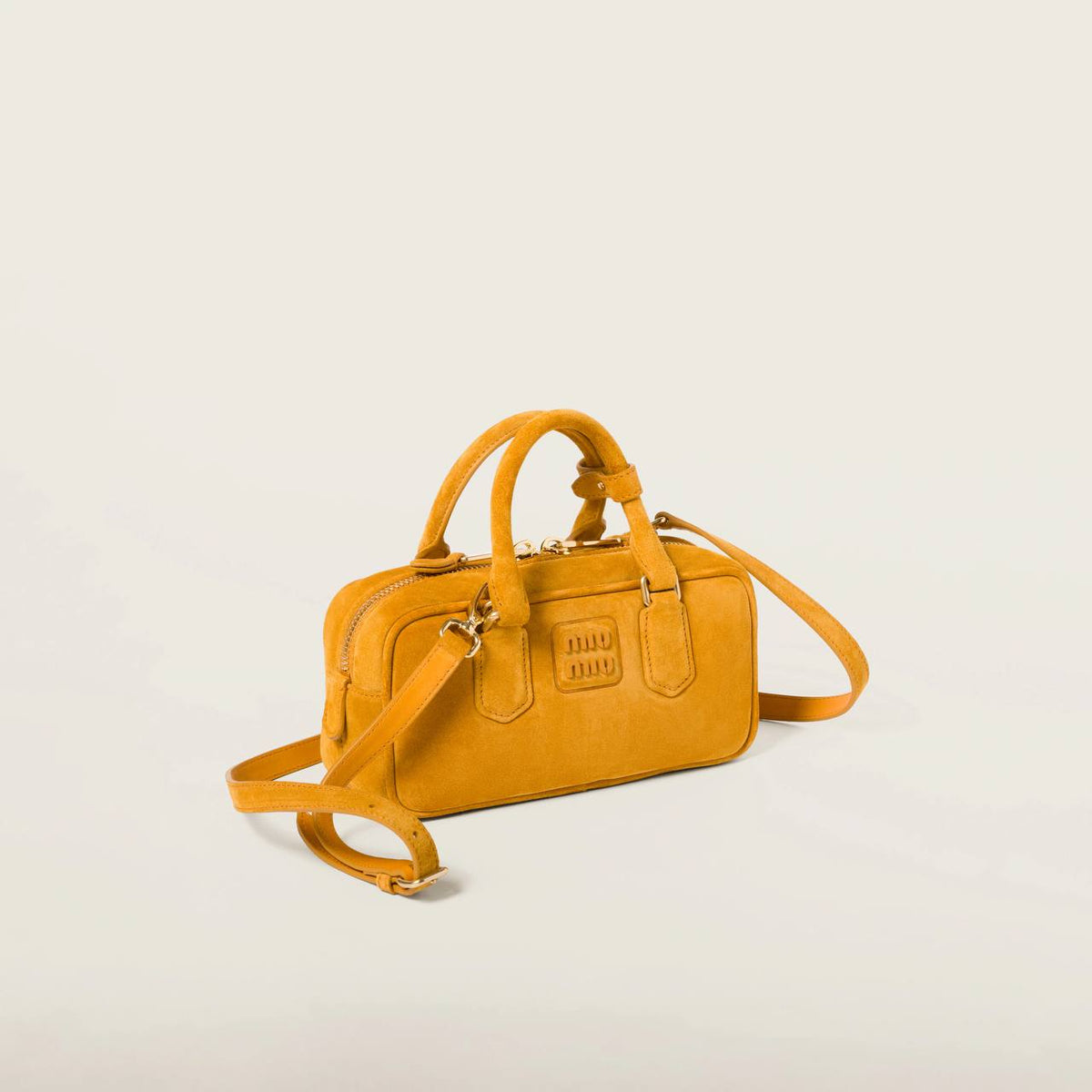 Cuero | Arcadie padded suede top-handle bag in Whiskey