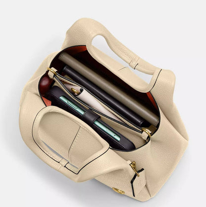Cuero | Lana 23 small leather Grap Bag