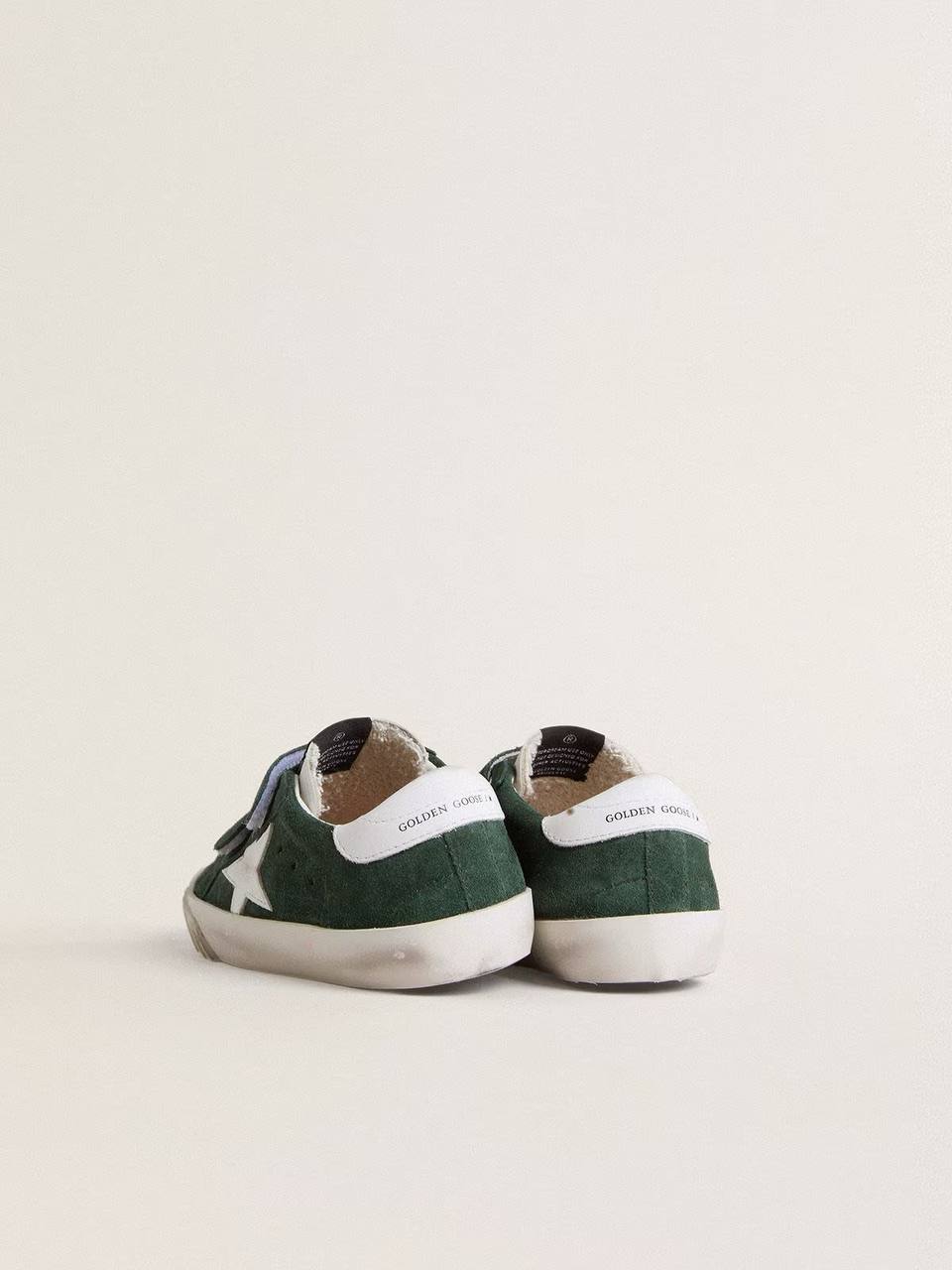 Cuero | Old School Young in green suede with white leather star and heel tab