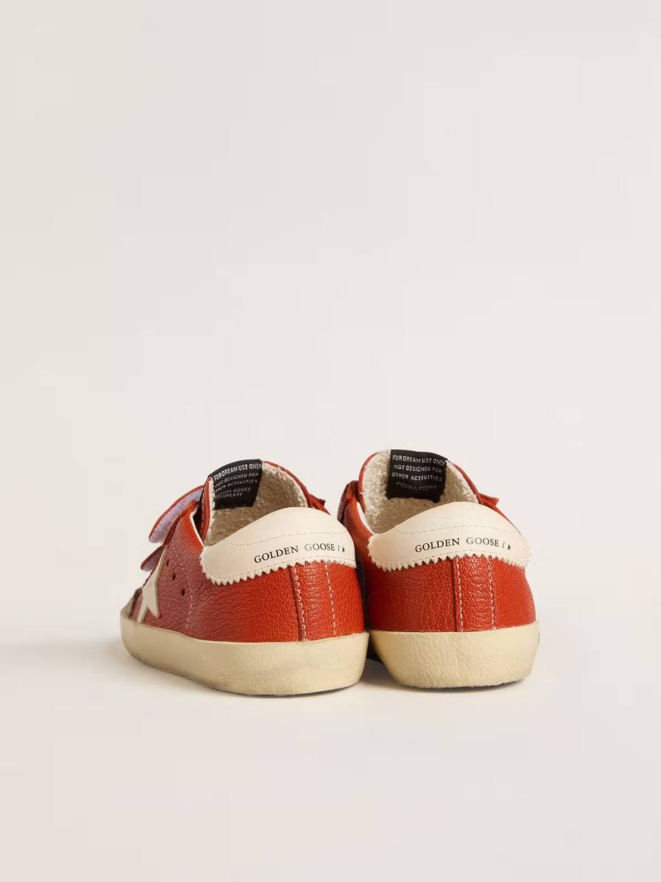 Cuero | Young Old School in orange nappa with white star and cream-colored leather heel tab