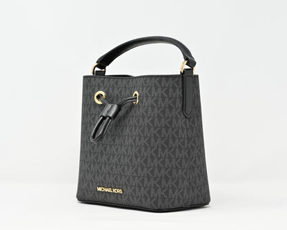 Cuero | SURI Small Logo Bucket Crossbody Black Signature Canvas