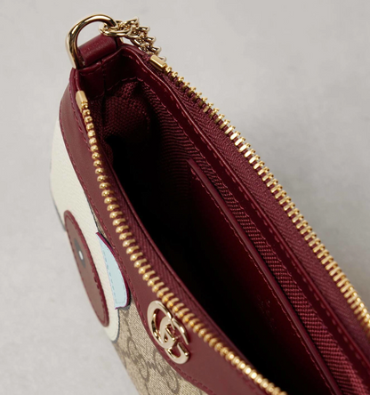 Cuero | Ophidia mini panda-appliqué shoulder bag